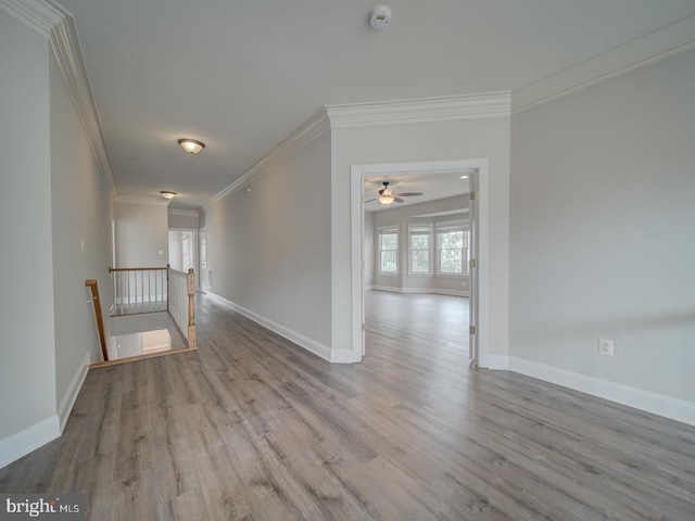 8429 Link Hills Loop, Gainesville, VA 20155 - unfurnished room with a smoke detector, ornamental molding, wood finished floors, and ceiling fan