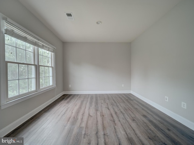 8429 Link Hills Loop, Gainesville, VA 20155 - unfurnished room featuring wood finished floors and baseboards