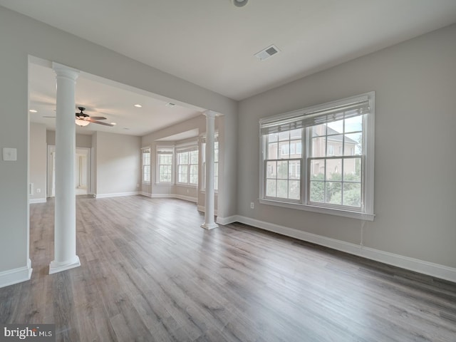 8429 Link Hills Loop, Gainesville, VA 20155 - unfurnished living room featuring ornate columns, wood finished floors, a ceiling fan, and recessed lighting