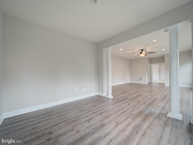 8429 Link Hills Loop, Gainesville, VA 20155 - unfurnished living room with ornate columns, wood finished floors, a ceiling fan, and recessed lighting