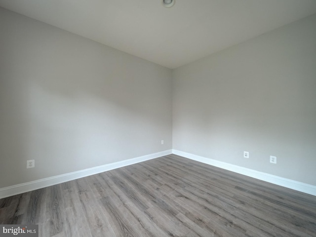 8429 Link Hills Loop, Gainesville, VA 20155 - empty room featuring baseboards and wood finished floors
