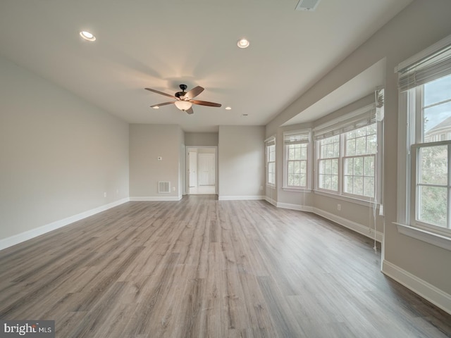 8429 Link Hills Loop, Gainesville, VA 20155 - unfurnished room with healthy amount of natural light, ceiling fan, wood finished floors, and recessed lighting