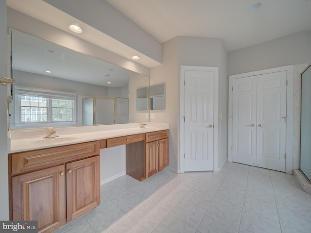 8429 Link Hills Loop, Gainesville, VA 20155 - bathroom with double vanity, a shower stall, recessed lighting, and tile patterned floors