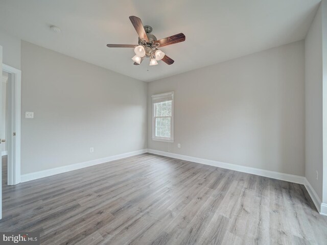 8429 Link Hills Loop, Gainesville, VA 20155 - spare room with a ceiling fan, wood finished floors, and a smoke detector