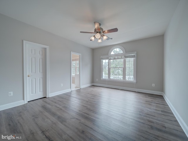 8429 Link Hills Loop, Gainesville, VA 20155 - unfurnished room with healthy amount of natural light, ceiling fan, and dark wood-type flooring