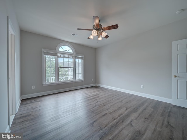 8429 Link Hills Loop, Gainesville, VA 20155 - spare room featuring ceiling fan, wood finished floors, and a smoke detector