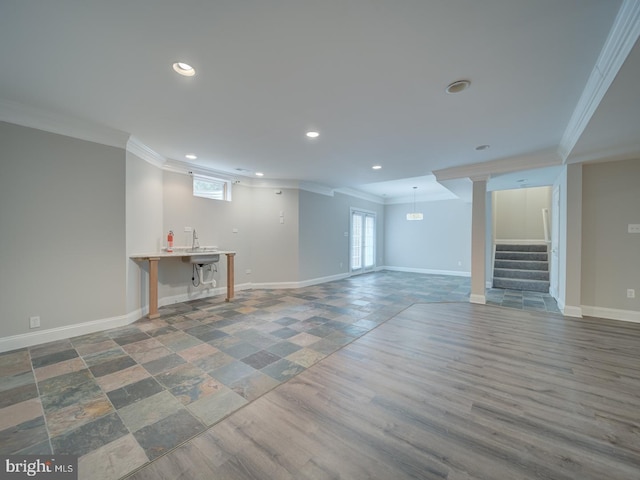 8429 Link Hills Loop, Gainesville, VA 20155 - basement featuring ornamental molding, stairway, recessed lighting, and stone finish flooring