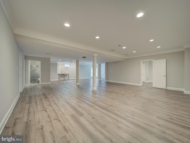 8429 Link Hills Loop, Gainesville, VA 20155 - unfurnished living room with ornamental molding, light wood finished floors, and recessed lighting