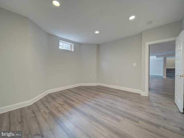 8429 Link Hills Loop, Gainesville, VA 20155 - spare room with wood finished floors, recessed lighting, and a smoke detector