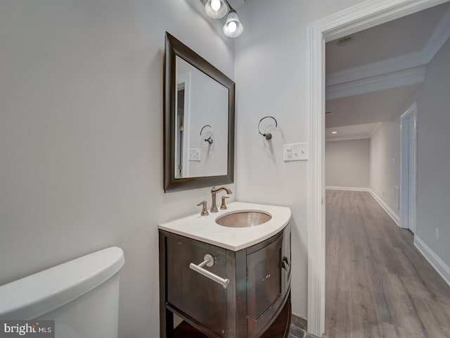 8429 Link Hills Loop, Gainesville, VA 20155 - bathroom with vanity, wood finished floors, and crown molding
