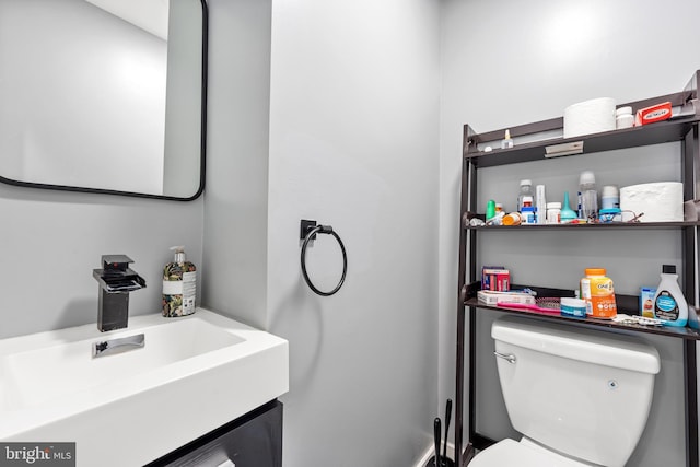 206 Fernon St, Philadelphia, PA 19148 - half bathroom featuring toilet and vanity