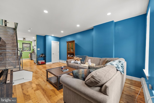 206 Fernon St, Philadelphia, PA 19148 - living area with light wood-style floors, recessed lighting, and stairs