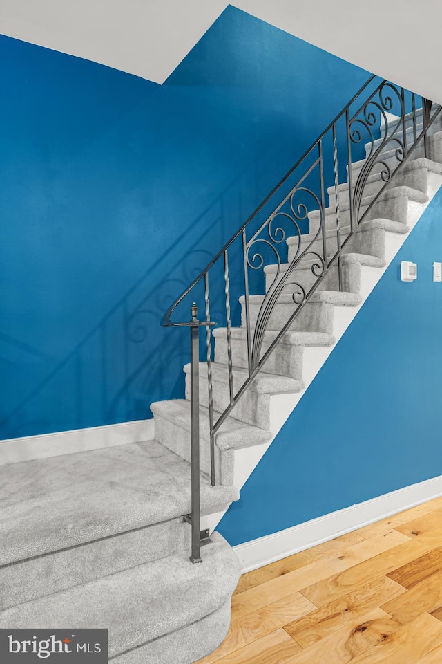 206 Fernon St, Philadelphia, PA 19148 - staircase featuring baseboards and wood finished floors
