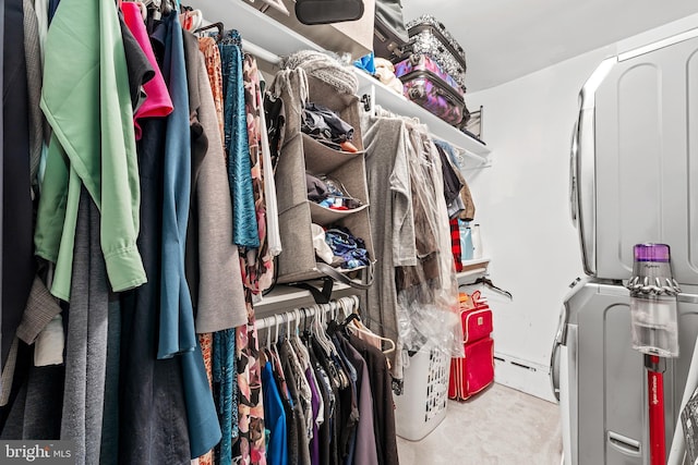 206 Fernon St, Philadelphia, PA 19148 - walk in closet with stacked washing machine and dryer and carpet flooring