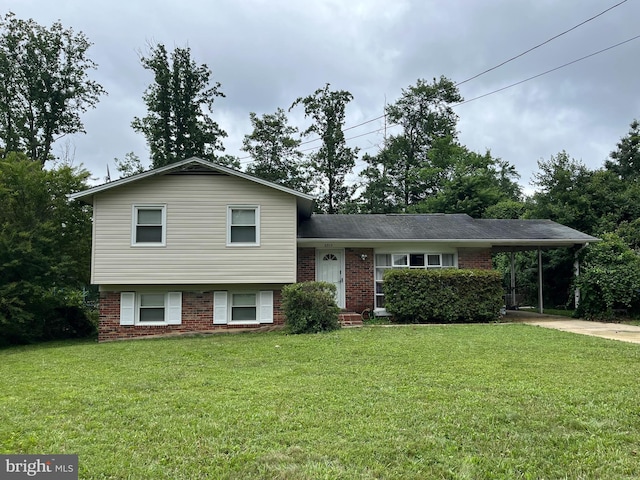 6313 Bardu Ave, Springfield, VA 22152 - split level home with a front yard, a carport, brick siding, and driveway
