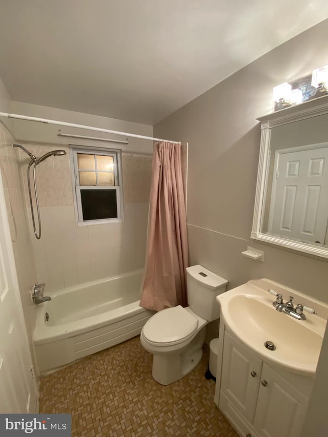 6313 Bardu Ave, Springfield, VA 22152 - full bathroom featuring shower / tub combo with curtain and vanity