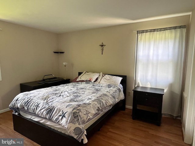 6313 Bardu Ave, Springfield, VA 22152 - bedroom with wood finished floors and baseboards