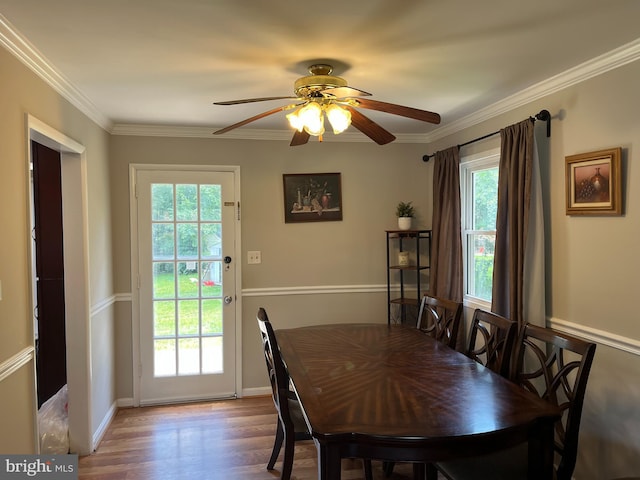 6313 Bardu Ave, Springfield, VA 22152 - dining area with ceiling fan, wood finished floors, and ornamental molding