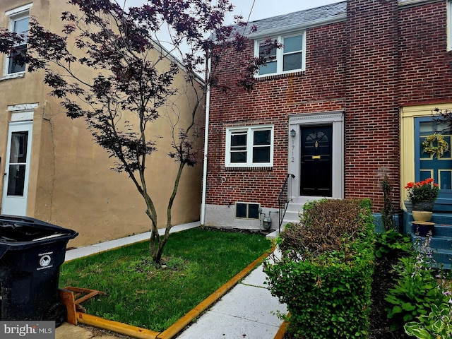 1712 Tulip St, Wilmington, DE 19805 - view of home's exterior featuring brick siding and entry steps