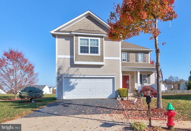 2018 Silver Bell Ct, Culpeper, VA 22701 - traditional-style house with asphalt driveway, an attached garage, a porch, and a front yard