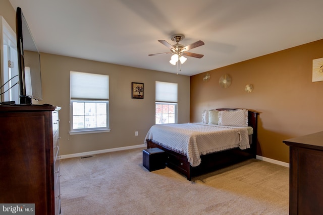 2018 Silver Bell Ct, Culpeper, VA 22701 - bedroom with light colored carpet and a ceiling fan