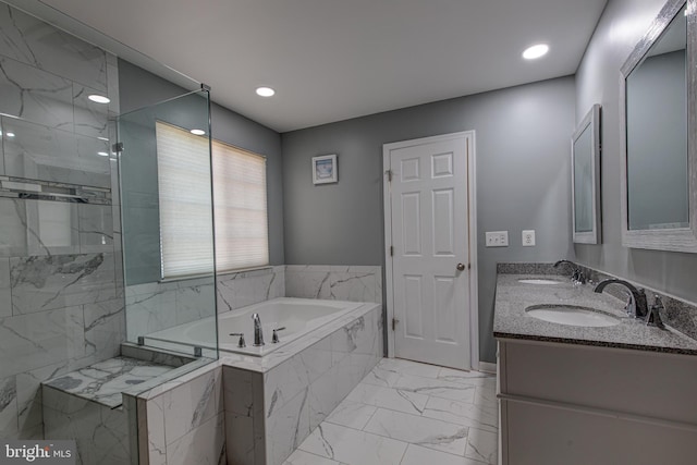 2018 Silver Bell Ct, Culpeper, VA 22701 - bathroom featuring a bath, marble look tiles, double vanity, a marble finish shower, and recessed lighting