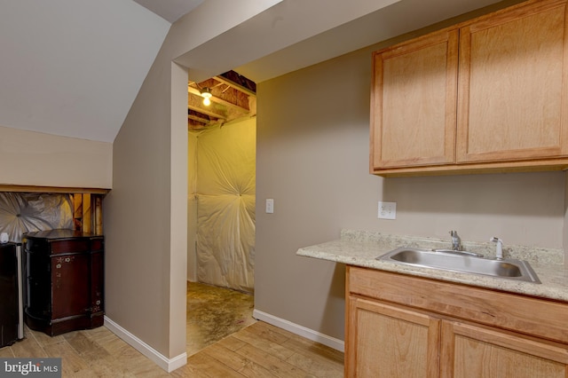 2018 Silver Bell Ct, Culpeper, VA 22701 - laundry room with a sink and light wood finished floors
