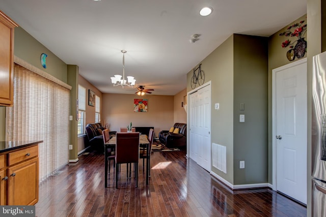 2018 Silver Bell Ct, Culpeper, VA 22701 - dining area with a chandelier and dark wood-style floors