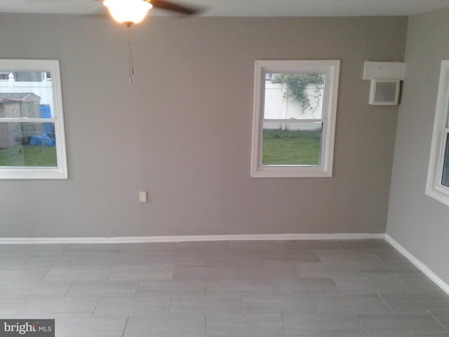 1209 Idylwood Rd, Pikesville, MD 21208 - spare room featuring a ceiling fan and baseboards