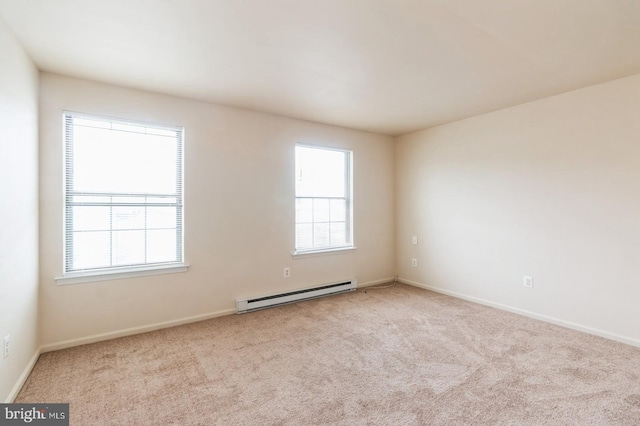 46 Hampshire Rd, Sicklerville, NJ 08081 - carpeted empty room featuring baseboard heating and baseboards