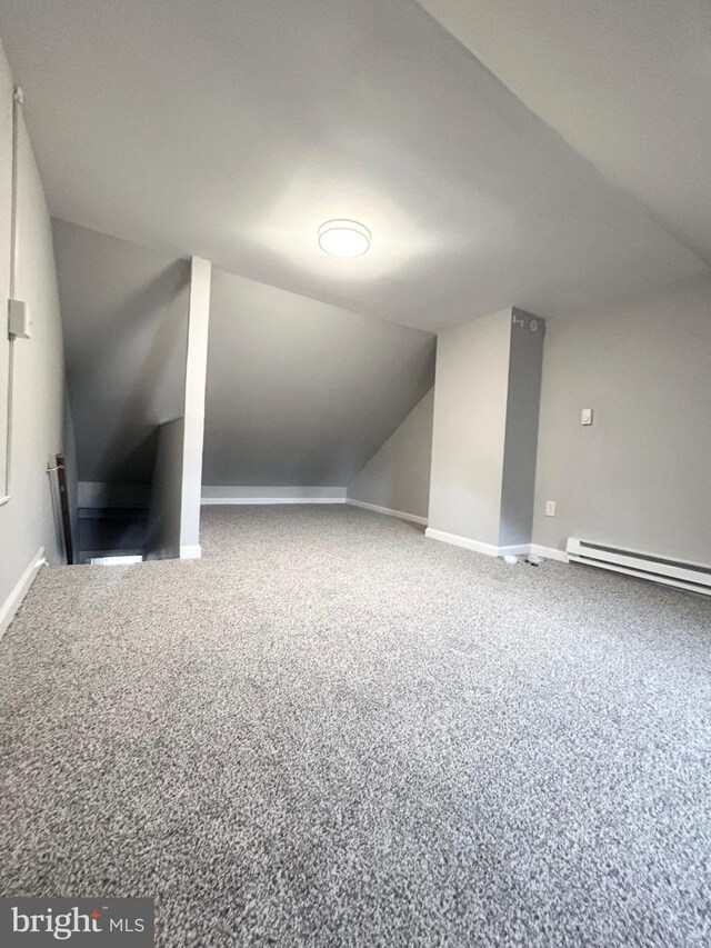 533 Franklin St, West Reading, PA 19611 - additional living space with carpet floors, baseboard heating, and vaulted ceiling