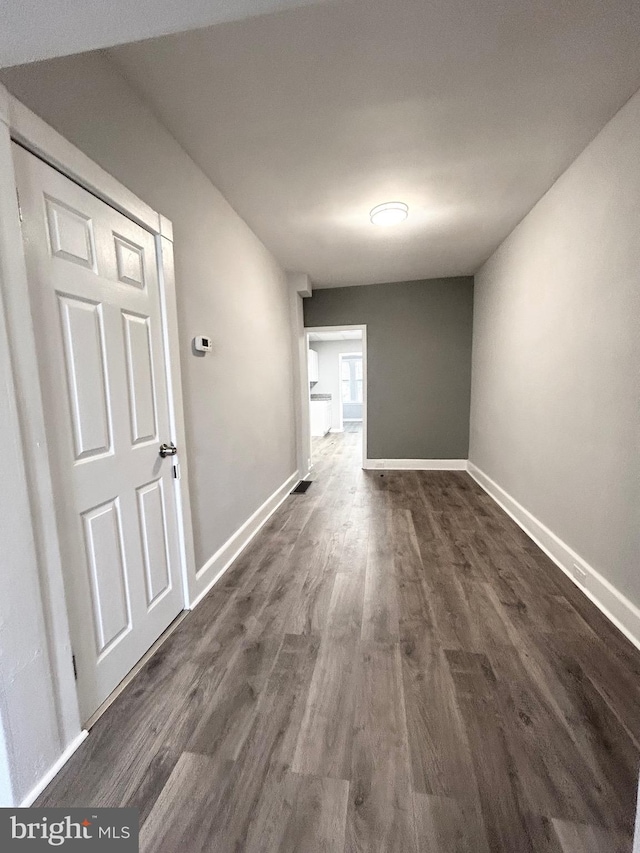 533 Franklin St, West Reading, PA 19611 - hallway featuring dark wood finished floors and baseboards