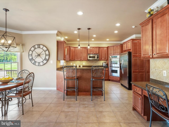 22124 Whitestone Ct, Smithsburg, MD 21783 - kitchen with appliances with stainless steel finishes, ornamental molding, decorative backsplash, a chandelier, and a peninsula