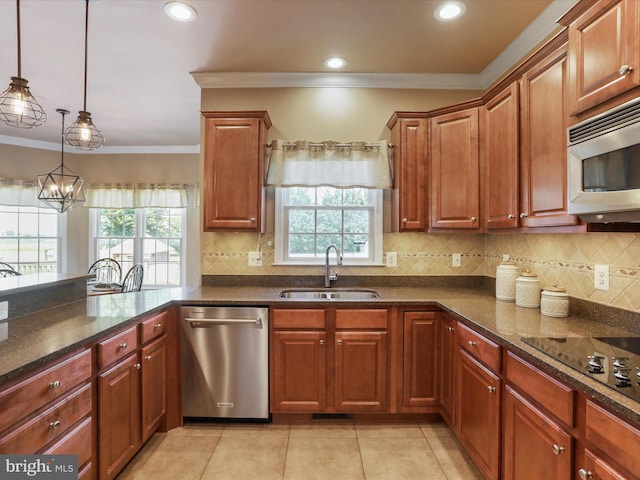 22124 Whitestone Ct, Smithsburg, MD 21783 - kitchen with appliances with stainless steel finishes, ornamental molding, dark stone countertops, decorative backsplash, and recessed lighting