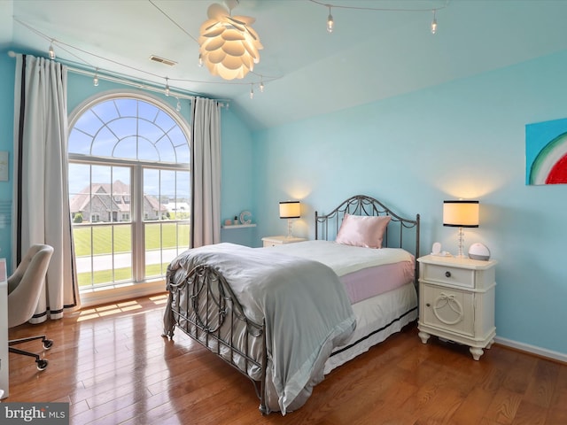 22124 Whitestone Ct, Smithsburg, MD 21783 - bedroom with vaulted ceiling and wood finished floors