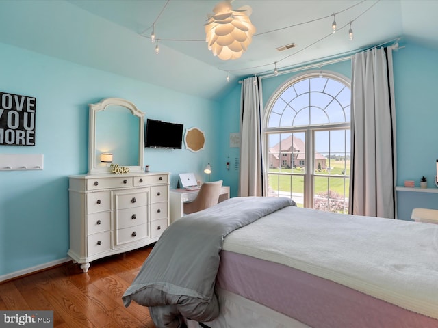 22124 Whitestone Ct, Smithsburg, MD 21783 - bedroom with lofted ceiling and dark wood-style flooring