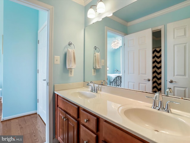 22124 Whitestone Ct, Smithsburg, MD 21783 - full bathroom featuring double vanity, ornamental molding, wood finished floors, and ensuite bathroom