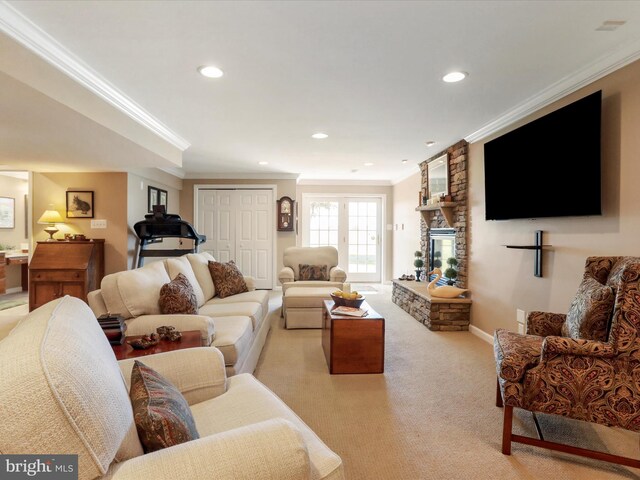 22124 Whitestone Ct, Smithsburg, MD 21783 - living room with ornamental molding, recessed lighting, light colored carpet, and a stone fireplace