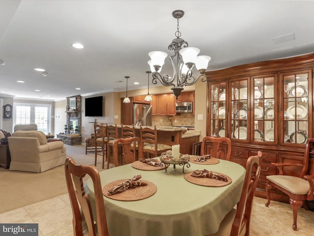 22124 Whitestone Ct, Smithsburg, MD 21783 - dining area featuring a chandelier, light tile patterned flooring, recessed lighting, and light colored carpet
