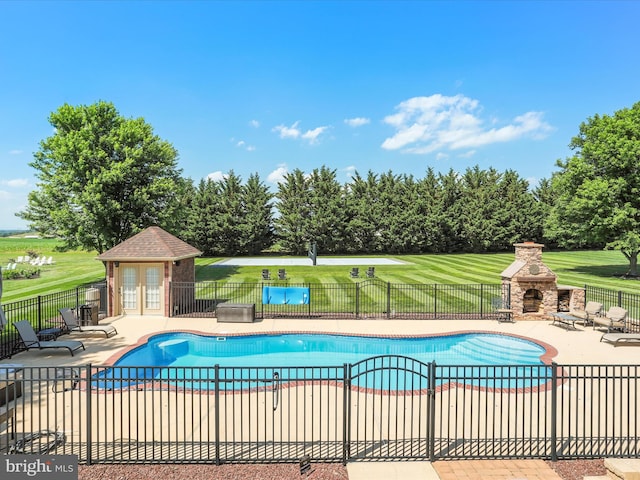 22124 Whitestone Ct, Smithsburg, MD 21783 - view of swimming pool with a patio area and a fireplace