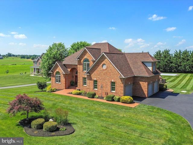 22124 Whitestone Ct, Smithsburg, MD 21783 - traditional home with brick siding, driveway, and a front lawn