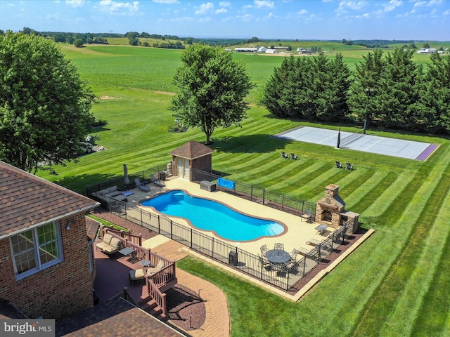 22124 Whitestone Ct, Smithsburg, MD 21783 - view of swimming pool featuring an outbuilding, a patio, an exterior structure, and a rural view