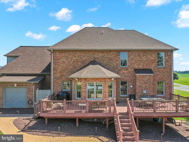 22124 Whitestone Ct, Smithsburg, MD 21783 - back of house with a shingled roof, a wooden deck, and brick siding