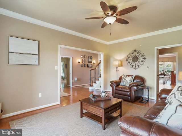 22124 Whitestone Ct, Smithsburg, MD 21783 - living room featuring crown molding, ceiling fan, stairs, and wood finished floors