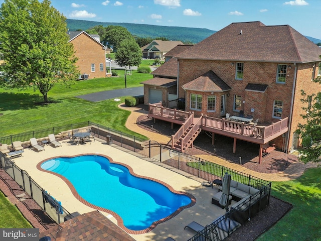 22124 Whitestone Ct, Smithsburg, MD 21783 - view of swimming pool with a deck, a patio area, and a fenced backyard