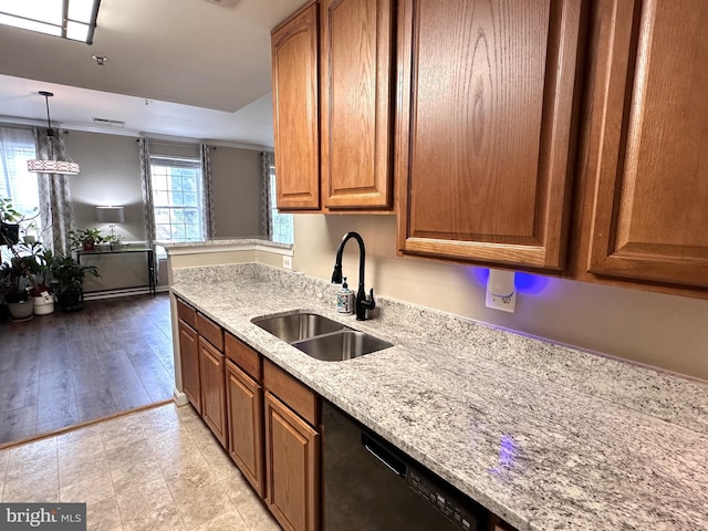 8980 Harrover Pl Unit 80B, Lorton, VA 22079 - kitchen with black dishwasher, light stone counters, brown cabinetry, and decorative light fixtures