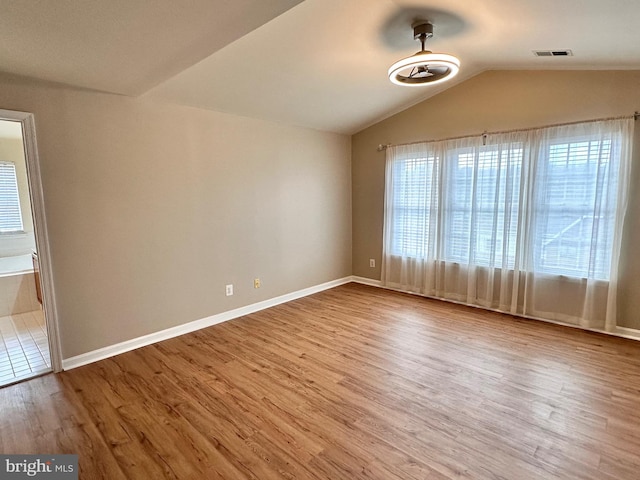 8980 Harrover Pl Unit 80B, Lorton, VA 22079 - empty room with wood finished floors and lofted ceiling