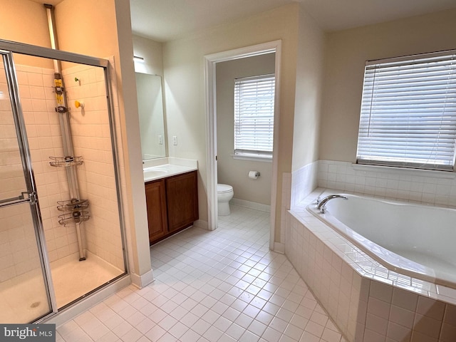 8980 Harrover Pl Unit 80B, Lorton, VA 22079 - full bath with tile patterned floors, a garden tub, a shower stall, vanity, and healthy amount of natural light