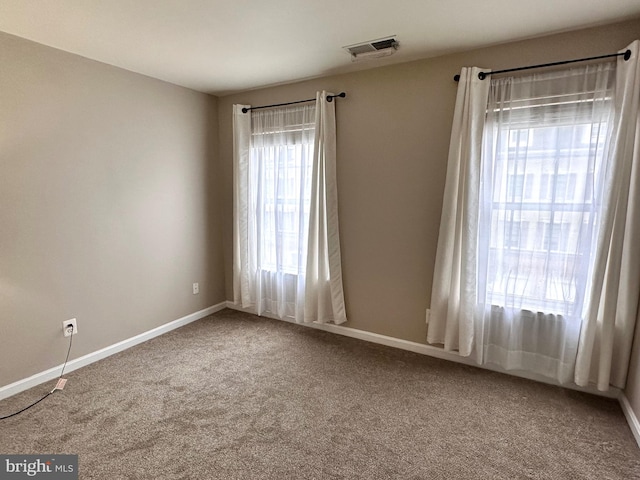 8980 Harrover Pl Unit 80B, Lorton, VA 22079 - carpeted spare room with baseboards