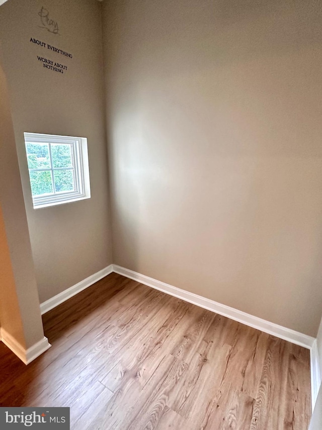 8980 Harrover Pl Unit 80B, Lorton, VA 22079 - spare room with wood finished floors and baseboards